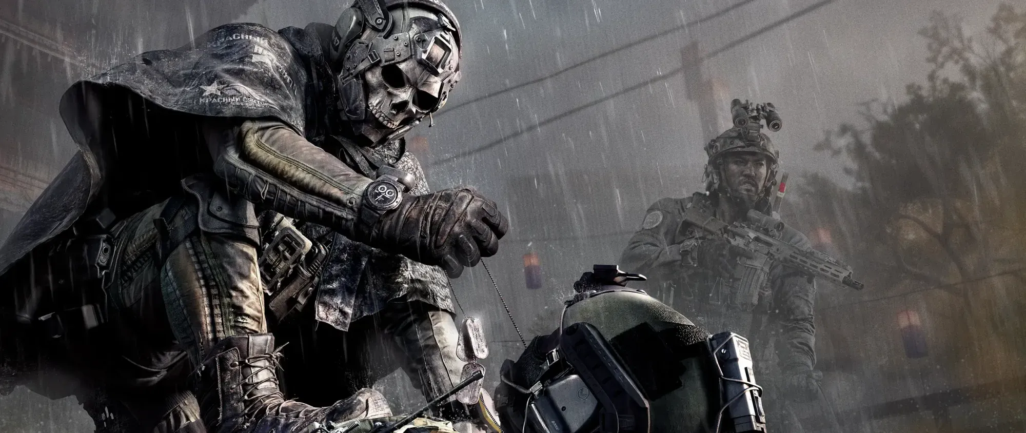 An operator in a skull mask clutching a dog tag in the rain, a second operator covering behind